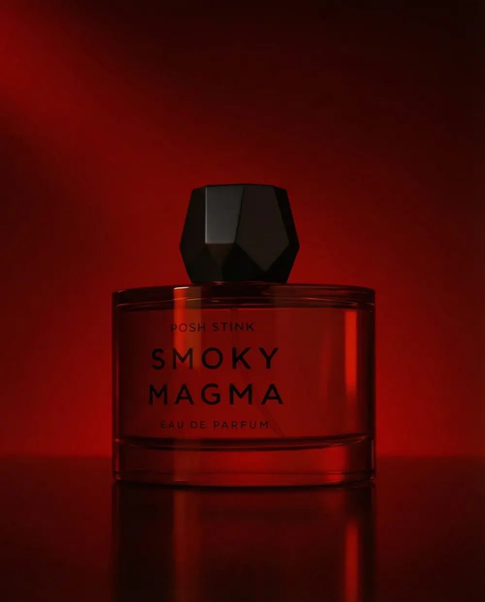 Smoky Magma by Posh Stink: a 100 ml bottle of eau de parfum photographed in the colour of its season